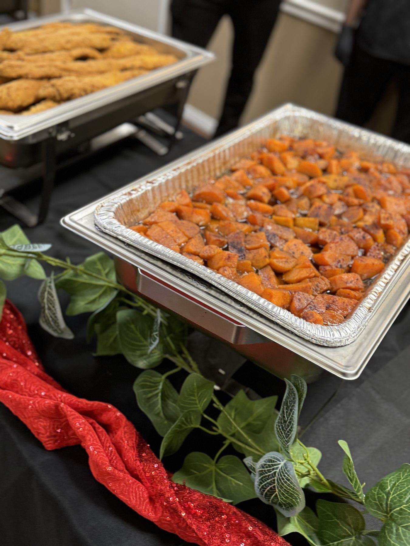 Warm catering tray of sauced shrimp or seafood